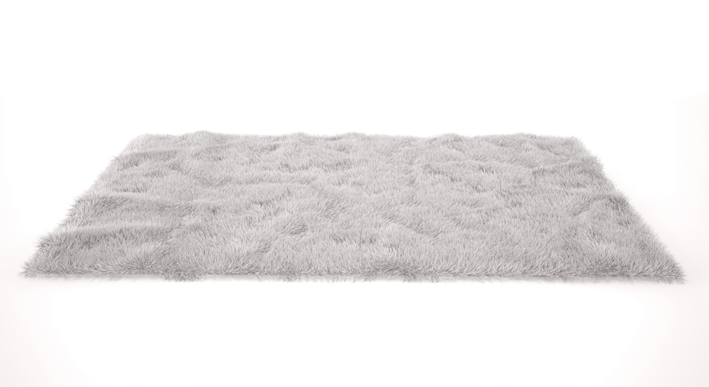 Tapis blanc en peluche